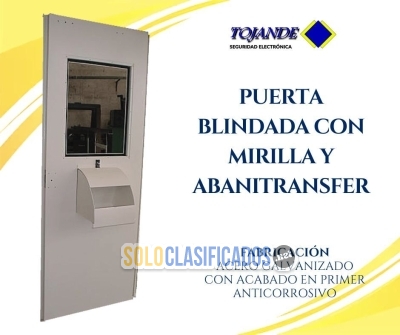 PUERTA BLINDADA CON MIRILLA GRANDE Y ROTOTRANSFER CUERPO TOJANDE... 